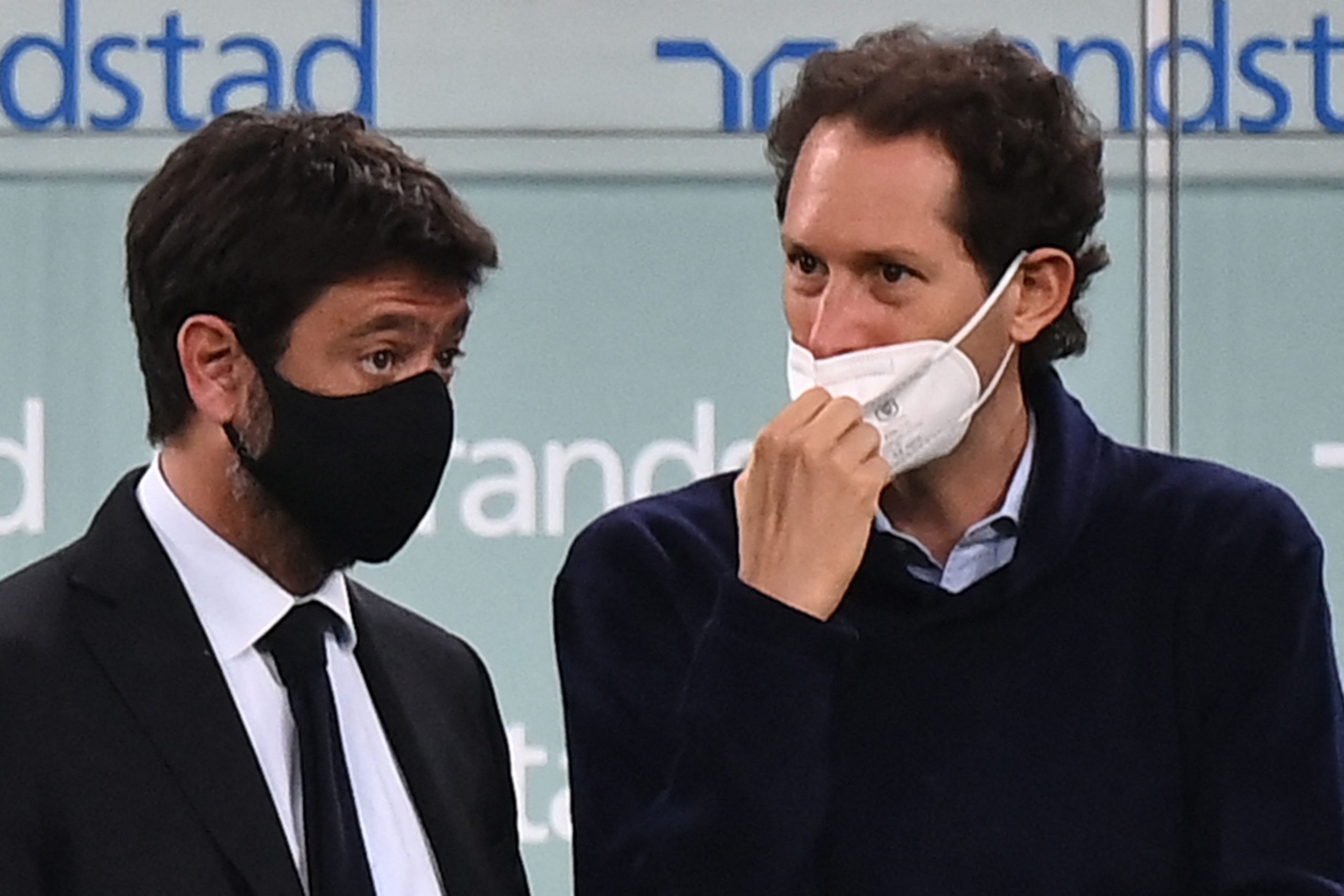 Juventus FC President Andrea Agnelli (L) and Fiat Chrysler Automobiles (FCA) Chairman John Elkann attend the Italian Serie A football match Juventus vs AC Milan on May 09, 2021 at the Juventus stadium in Turin. (Photo by Marco BERTORELLO / AFP) (Photo by MARCO BERTORELLO/AFP via Getty Images)