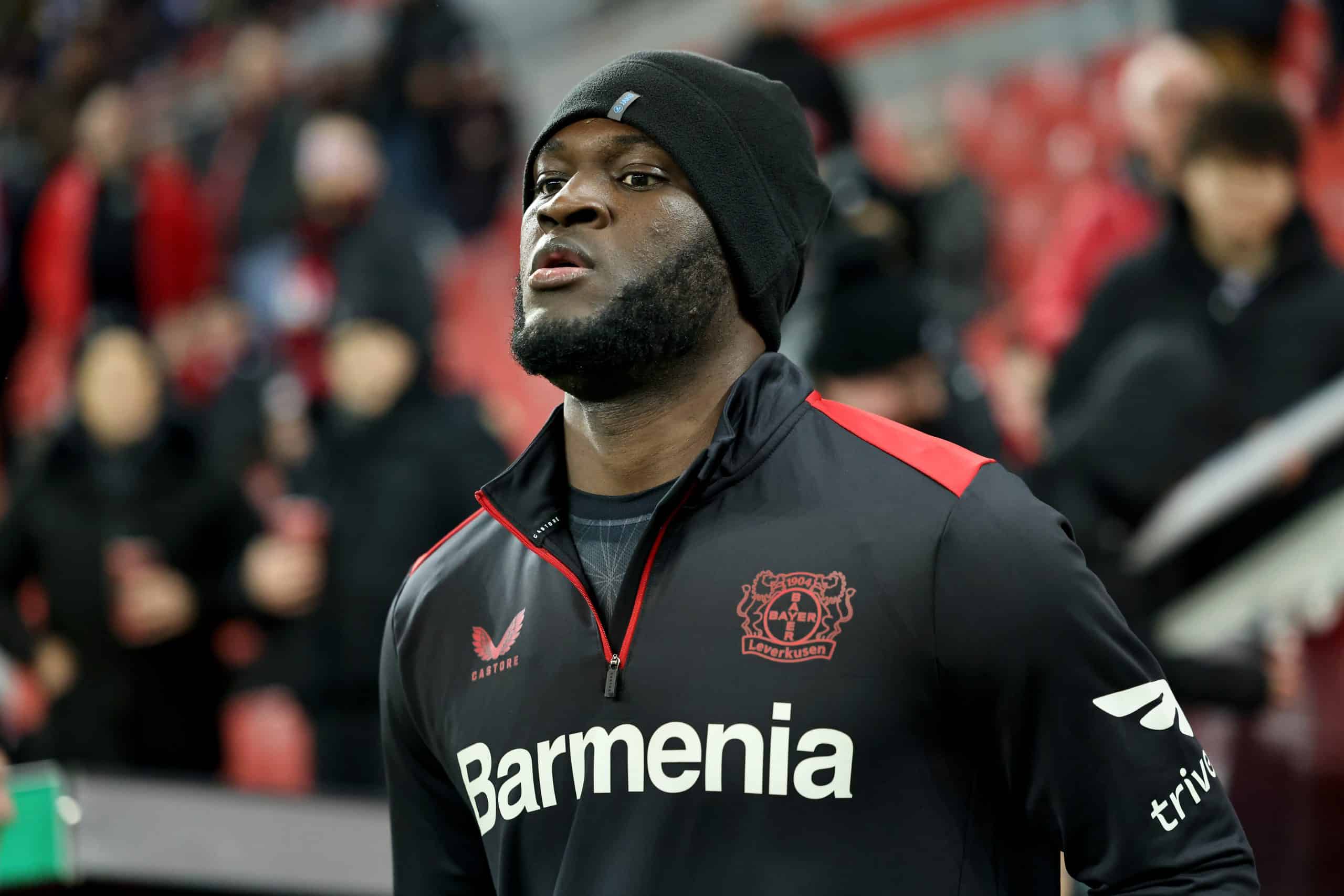 LEVERKUSEN, GERMANY - DECEMBER 06: Victor Boniface of Leverkusen prepares prior to the DFB cup round of 16 match between Bayer 04 Leverkusen and SC Paderborn 07 at BayArena on December 06, 2023 in Leverkusen, Germany. (Photo by Christof Koepsel/Getty Images)
