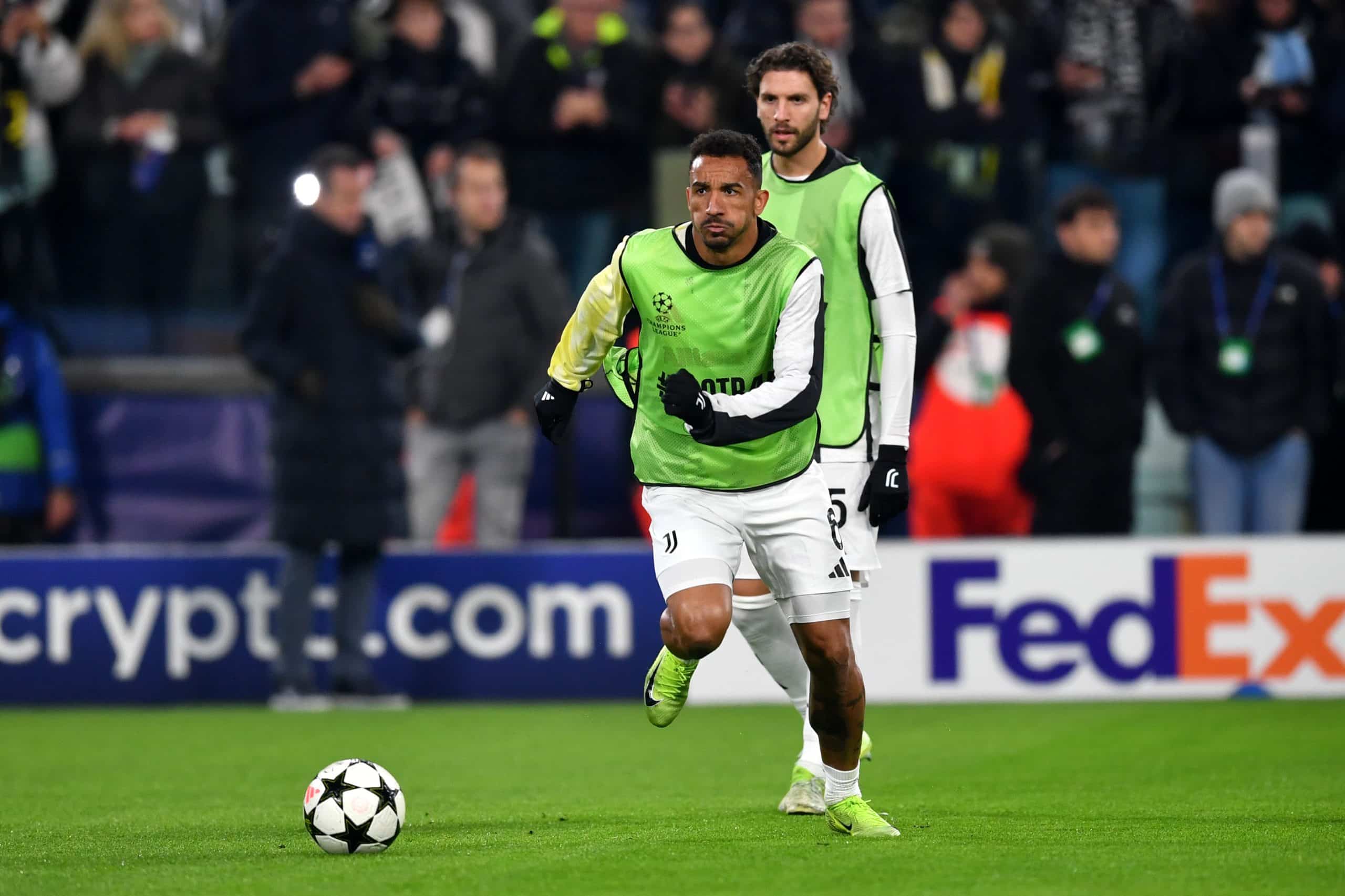 TURIN, ITALY - DECEMBER 11: Danilo of Juventus warms up ahead of the UEFA Champions League 2024/25 League Phase MD6 match between Juventus and Manchester City at Juventus Stadium on December 11, 2024 in Turin, Italy. (Photo by Valerio Pennicino/Getty Images)