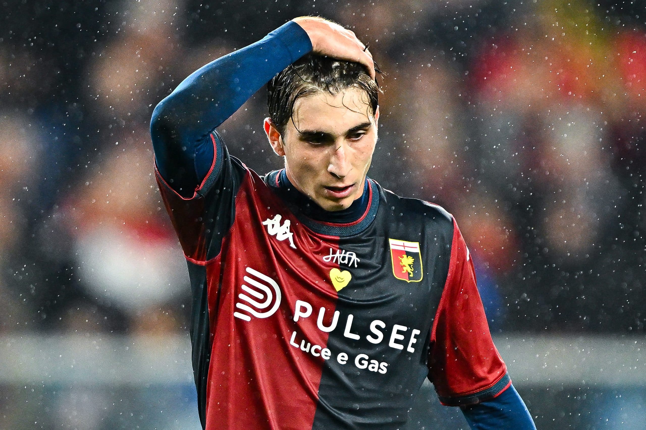 GENOA, ITALY - DECEMBER 7: Fabio Miretti of Genoa reacts with disappointment during the Serie A match between Genoa and Torino at Stadio Luigi Ferraris on December 7, 2024 in Genoa, Italy. (Photo by Simone Arveda/Getty Images)
