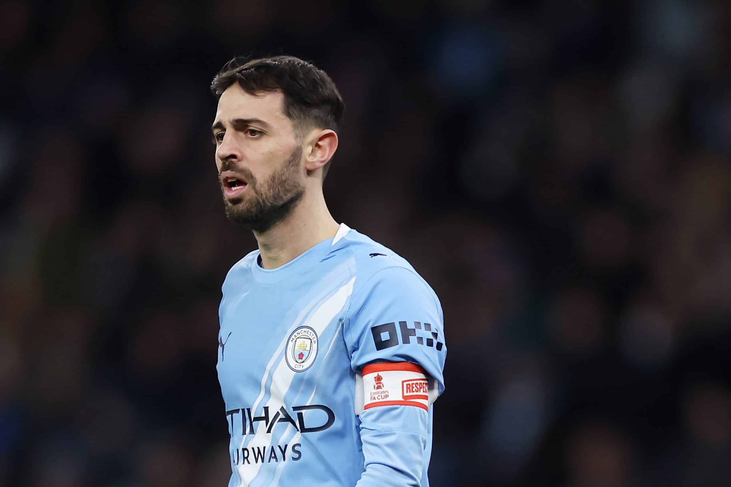MANCHESTER, ENGLAND - JANUARY 10: Bernardo Silva of Manchester City looks on whilst wearing the Respect captain's armband during the Emirates FA Cup Third Round match between Manchester City and Exeter City on January 10, 2026 in Manchester, England. (Photo by Lewis Storey/Getty Images)